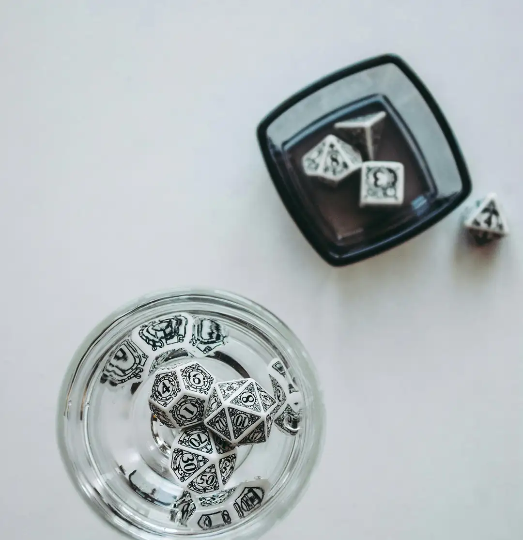 ow To Set Time Aside For D&D Sessions dungeons and dragons blog dice hedron dice in cup black and white cool design
